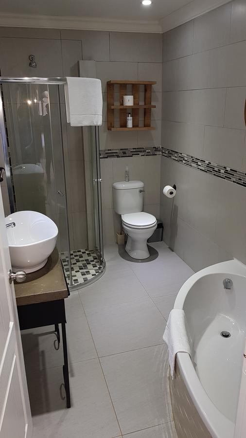 Touching Senses Garden Cottages บลูมฟอนเทน ภายนอก รูปภาพ